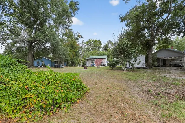 a balcony with table and chairs