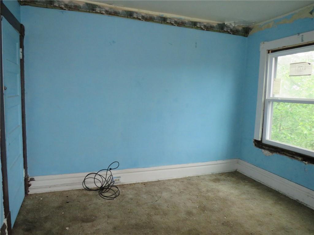 1465 Steuben Street Pittsburgh, PA 15205 - Photo 17 of 24 a view of a room with rack on the wall and a window