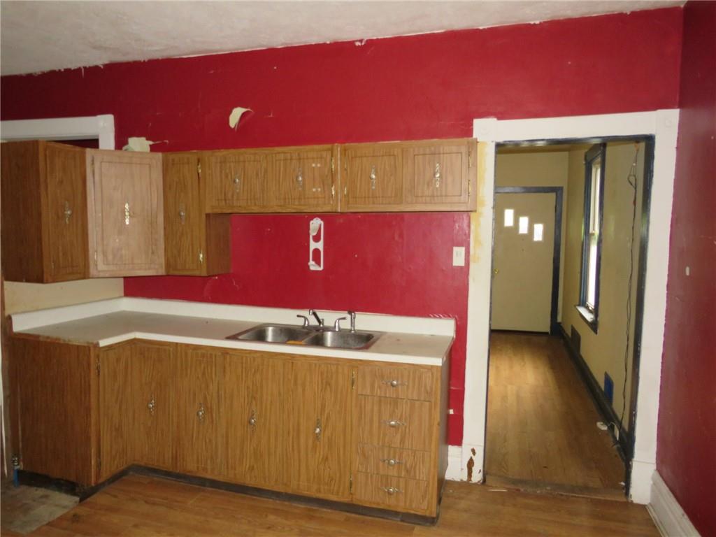 1465 Steuben Street Pittsburgh, PA 15205 - Photo 10 of 24 a room with a bed and a mirror