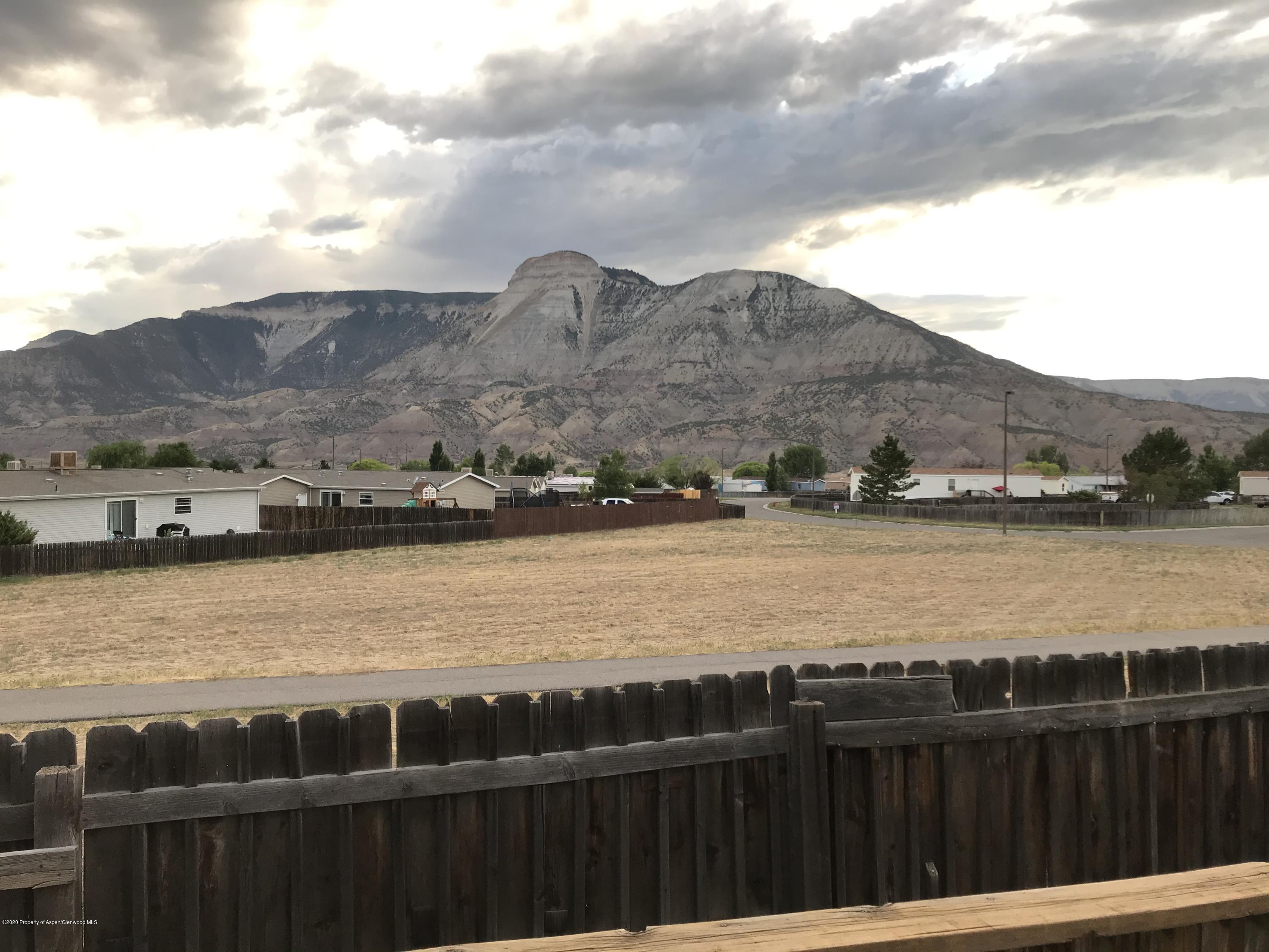 106 Cedar Circle Parachute, CO 81635 - Photo 21 of 22 a view of a lake with a mountain view