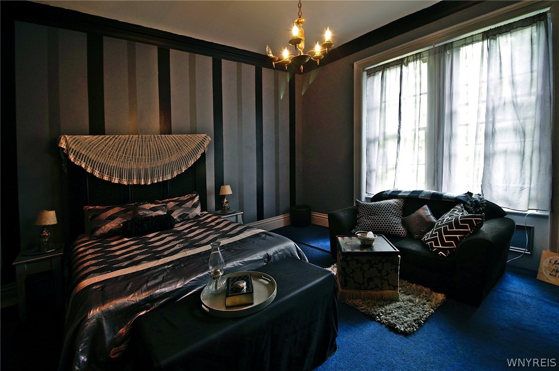 39 South Street Amity, NY 14813 - Photo 34 of 49 A BOLD MIX OF LIGHT AND DARK GIVE THIS BEDROOM A D