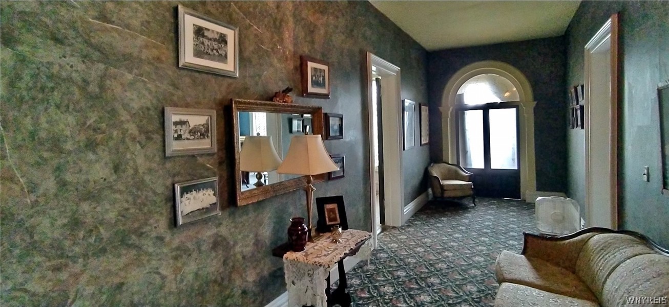 39 South Street Amity, NY 14813 - Photo 40 of 49 WIDE ARCHED WINDOW BATHES THE SECOND FLOOR HALLWAY