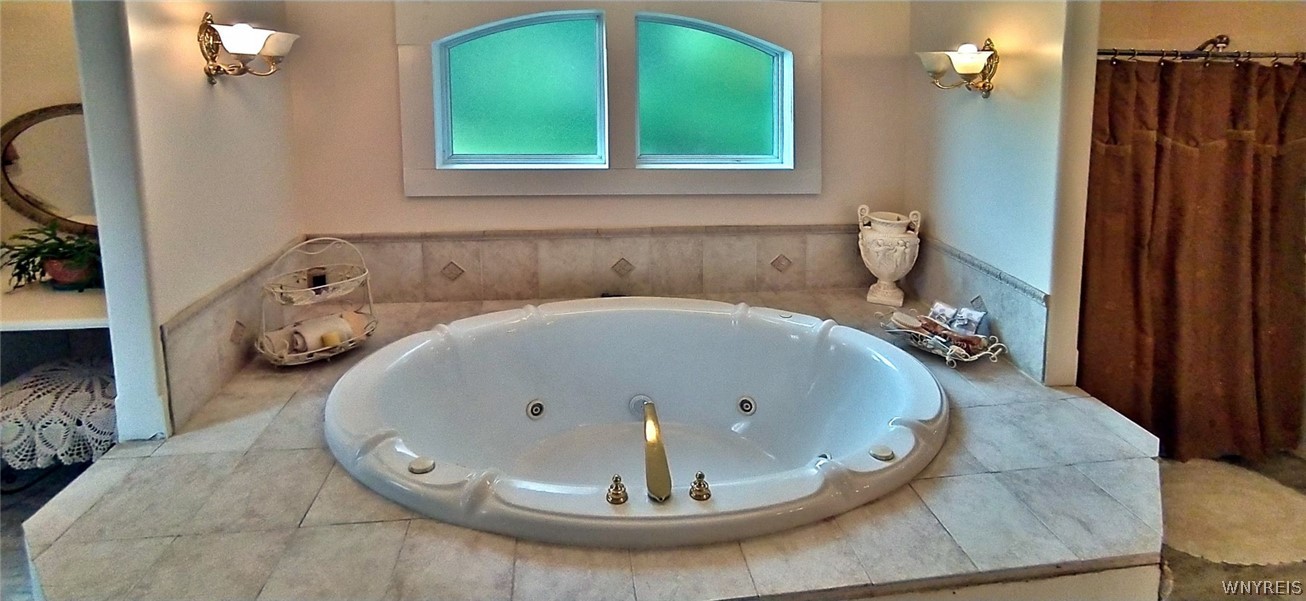 39 South Street Amity, NY 14813 - Photo 43 of 49 A luxurious whirlpool tub invites you to linger an