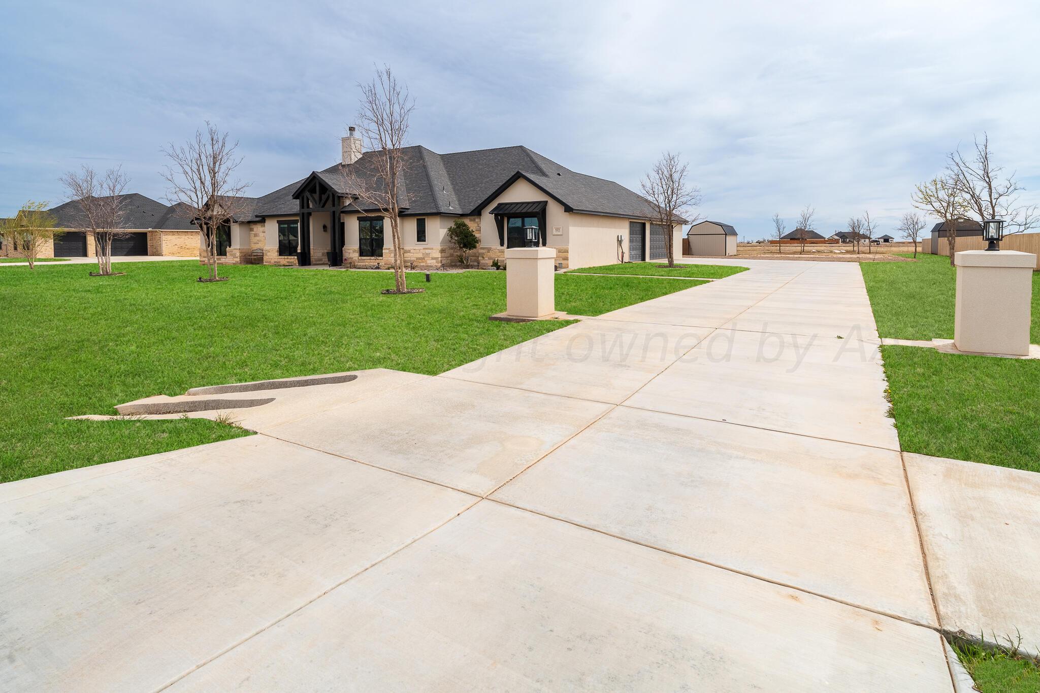 4251 Wildcat Springs Road Amarillo, TX 79119 - Photo 3 of 67 4251 Wildcat Springs - Front of House 5