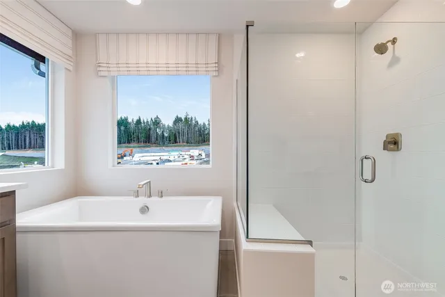 a bathroom with a sink and a window