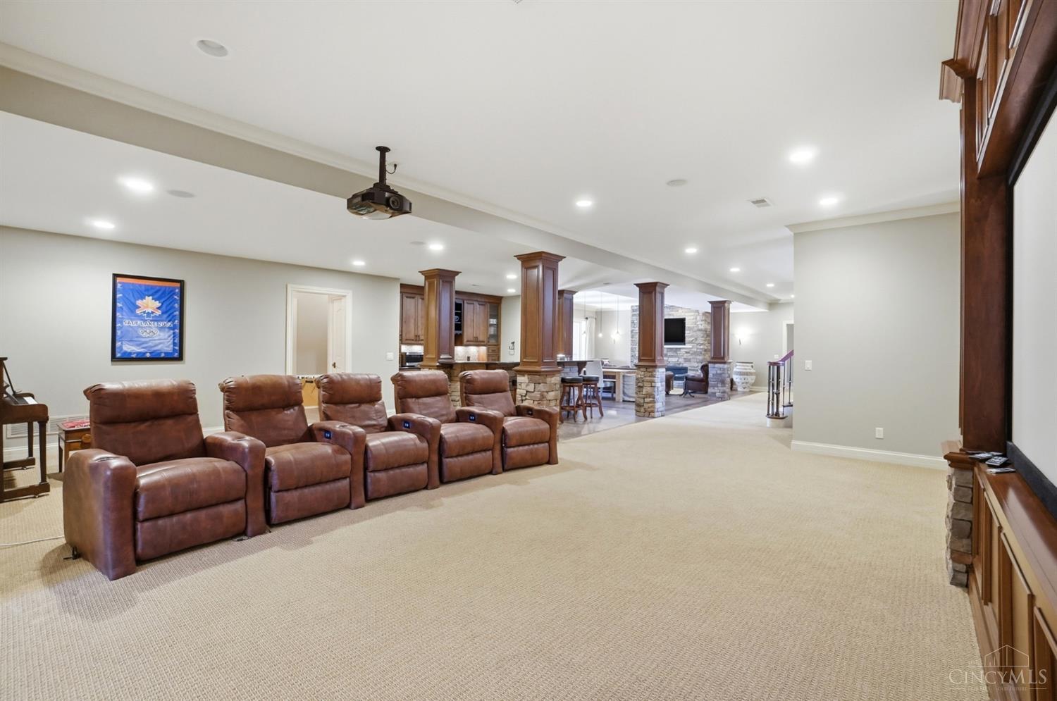 4535 Drake Road Cincinnati, OH 45243 - Photo 65 of 96 Enjoy movie night with friends in the finished lower level.