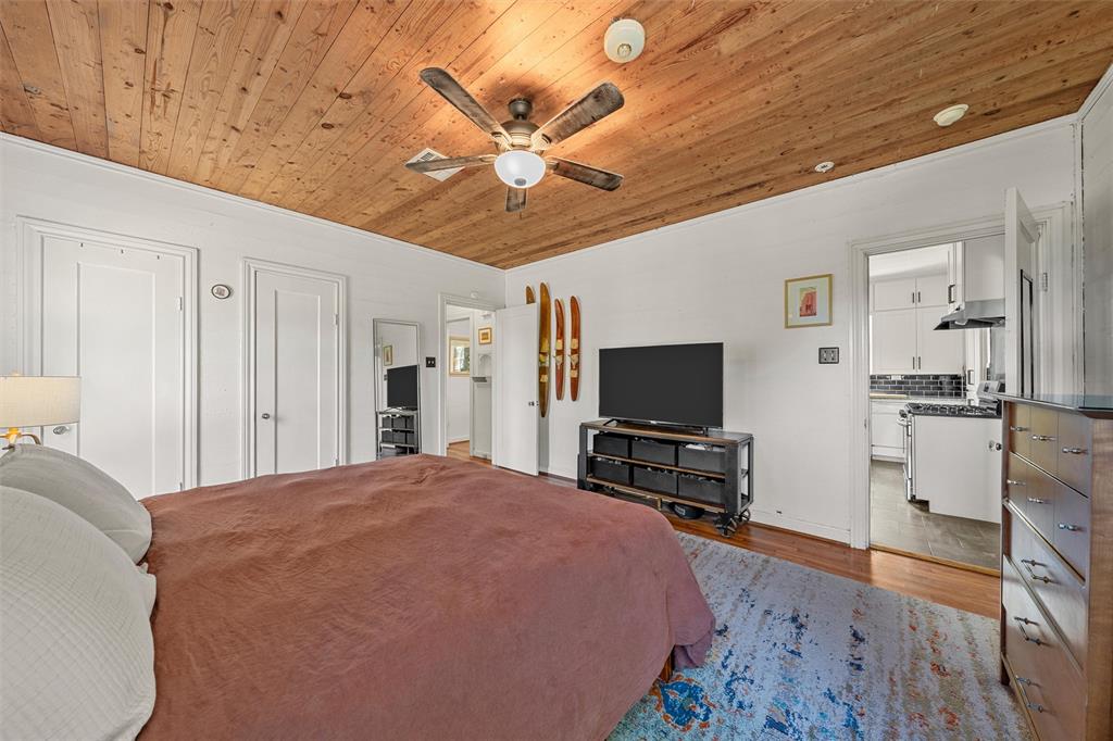 2730 Live Oak Avenue Waco, TX 76708 - Photo 15 of 26 a bedroom with a bed and a flat screen tv