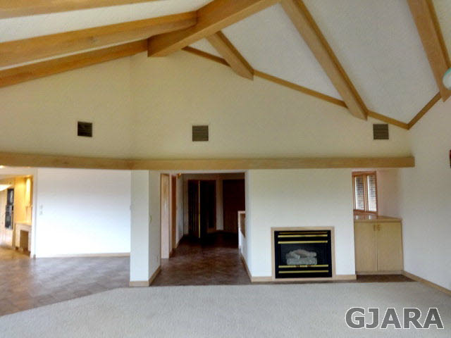855 25 Road Grand Junction, CO 81505 - Photo 12 of 41 a view of a livingroom with a fireplace