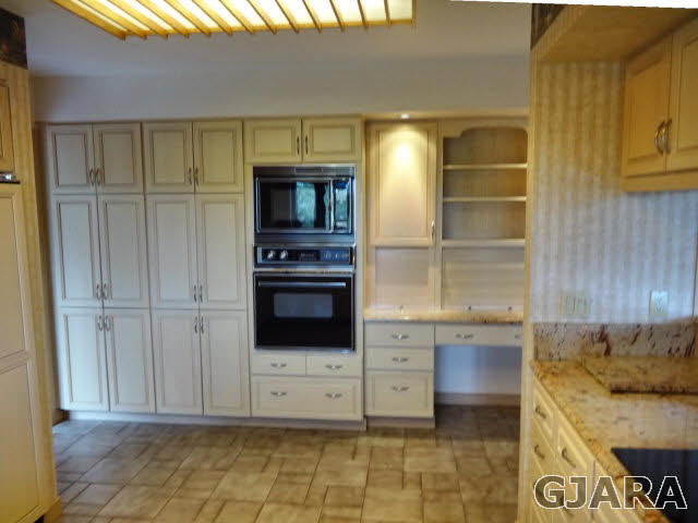 855 25 Road Grand Junction, CO 81505 - Photo 15 of 41 a view of kitchen with furniture and flat screen tv