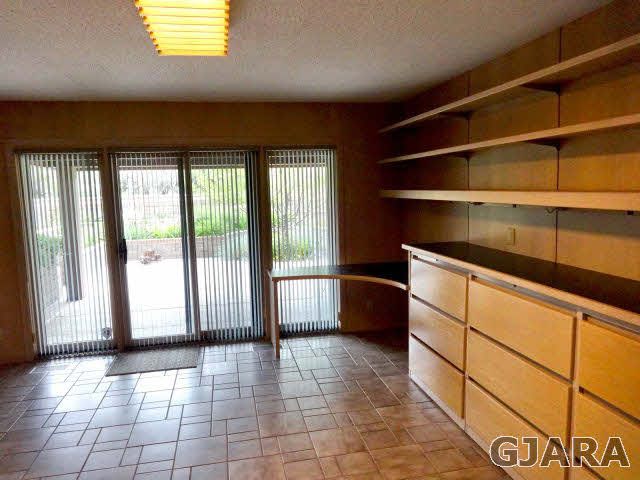 855 25 Road Grand Junction, CO 81505 - Photo 16 of 41 a kitchen with a sink and a large window