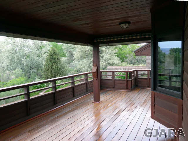 855 25 Road Grand Junction, CO 81505 - Photo 18 of 41 a view of a balcony with wooden floor