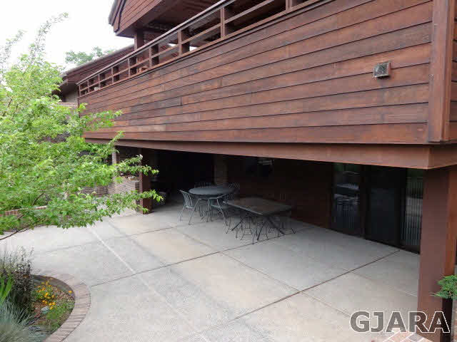 855 25 Road Grand Junction, CO 81505 - Photo 31 of 41 a backyard of a house with yard and outdoor seating