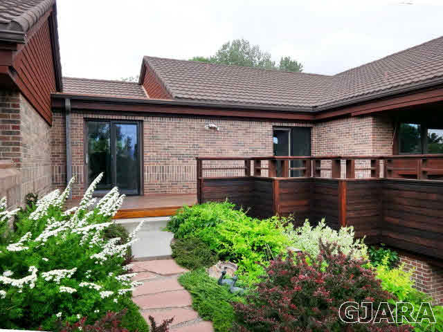 855 25 Road Grand Junction, CO 81505 - Photo 34 of 41 a front view of a house with garden
