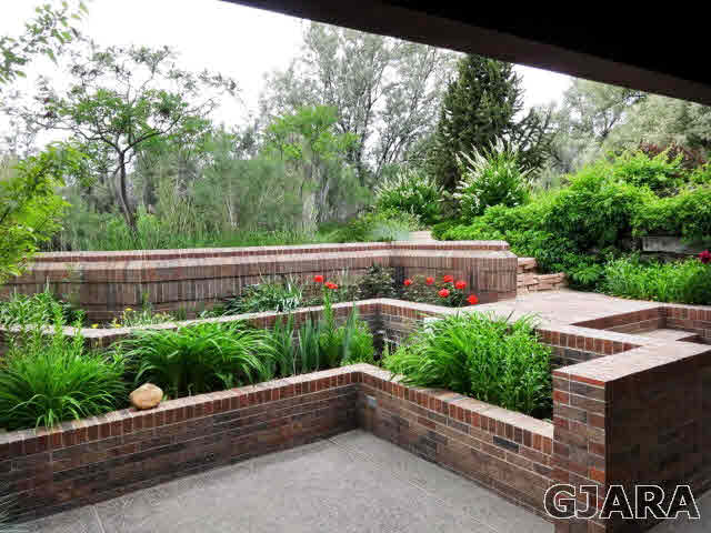 855 25 Road Grand Junction, CO 81505 - Photo 40 of 41 a view of a garden with wooden fence