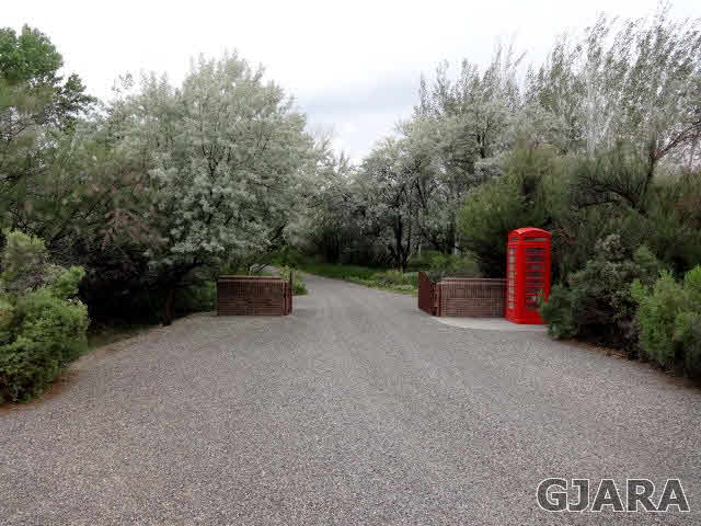 855 25 Road Grand Junction, CO 81505 - Photo 7 of 41 a backyard of a house with a yard and entertaining space