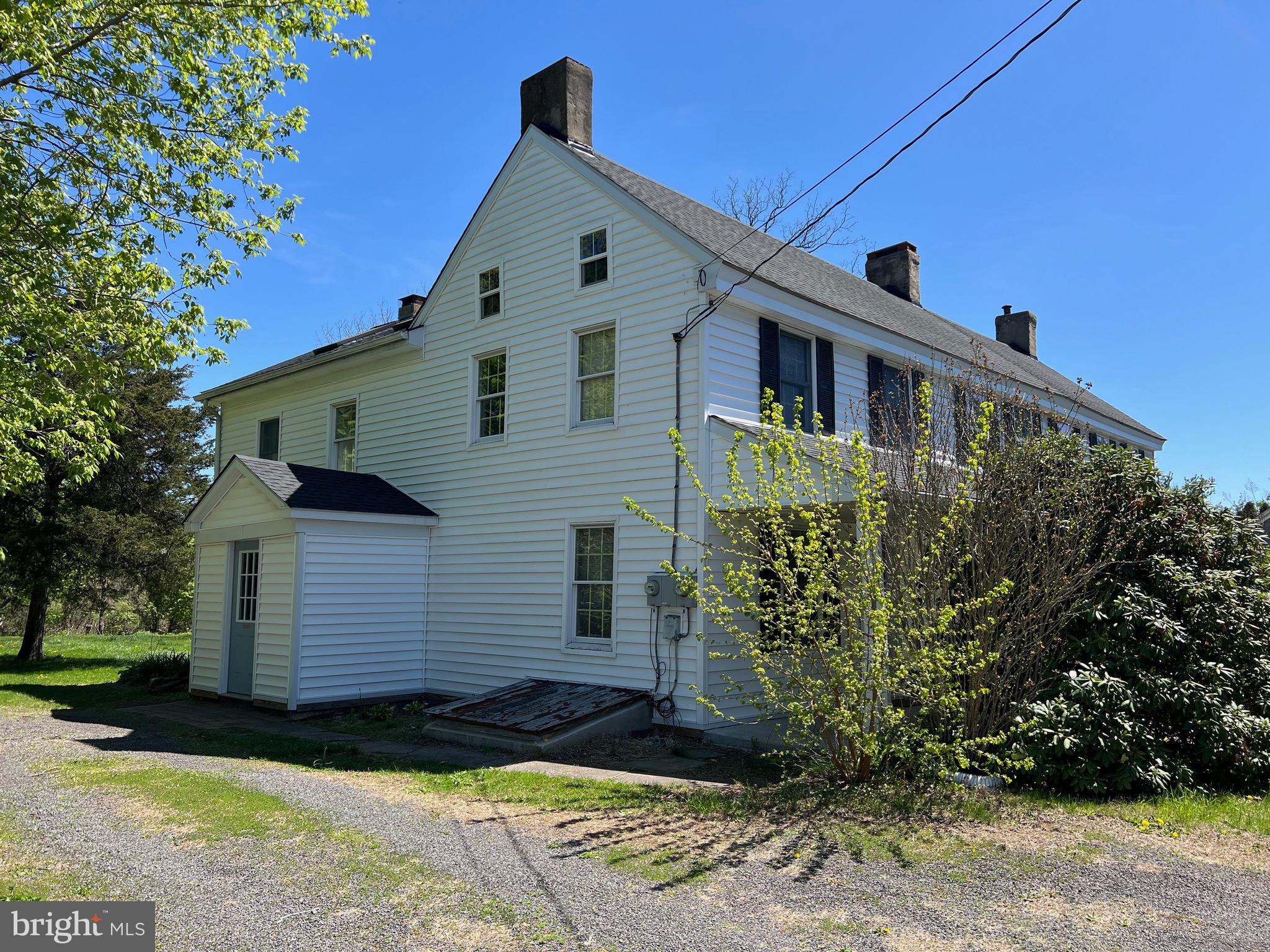 244 A Durham Road Ottsville, PA 18942 - Photo 2 of 4 a front view of a house with garden
