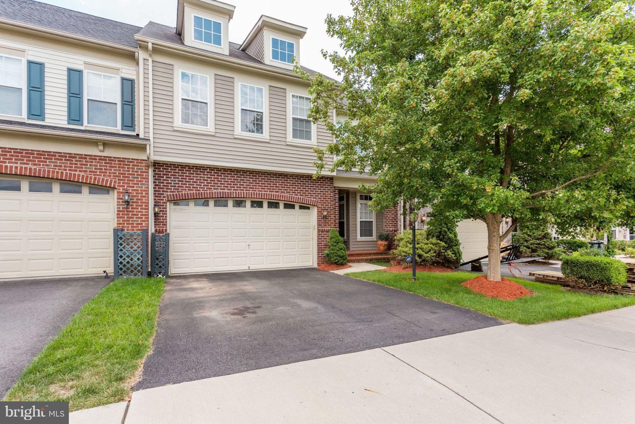 9195 Ribbon Falls Loop Bristow, VA 20136 - Photo 1 of 30 Exterior (Front)
