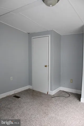 a bathroom with a toilet and shower