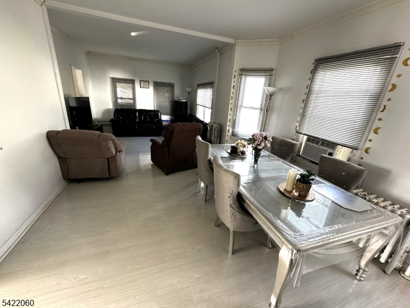 126 Bartholdi Avenue Butler, NJ 07405 - Photo 8 of 22 a living room with furniture and a table