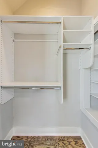 a view of a wooden deck with a yard