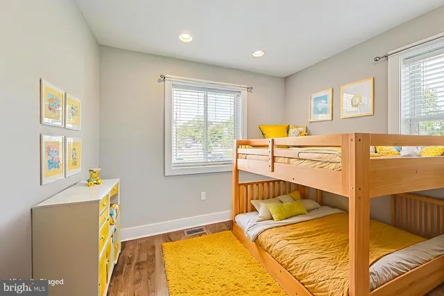 a bathroom with a shower a toilet and a sink