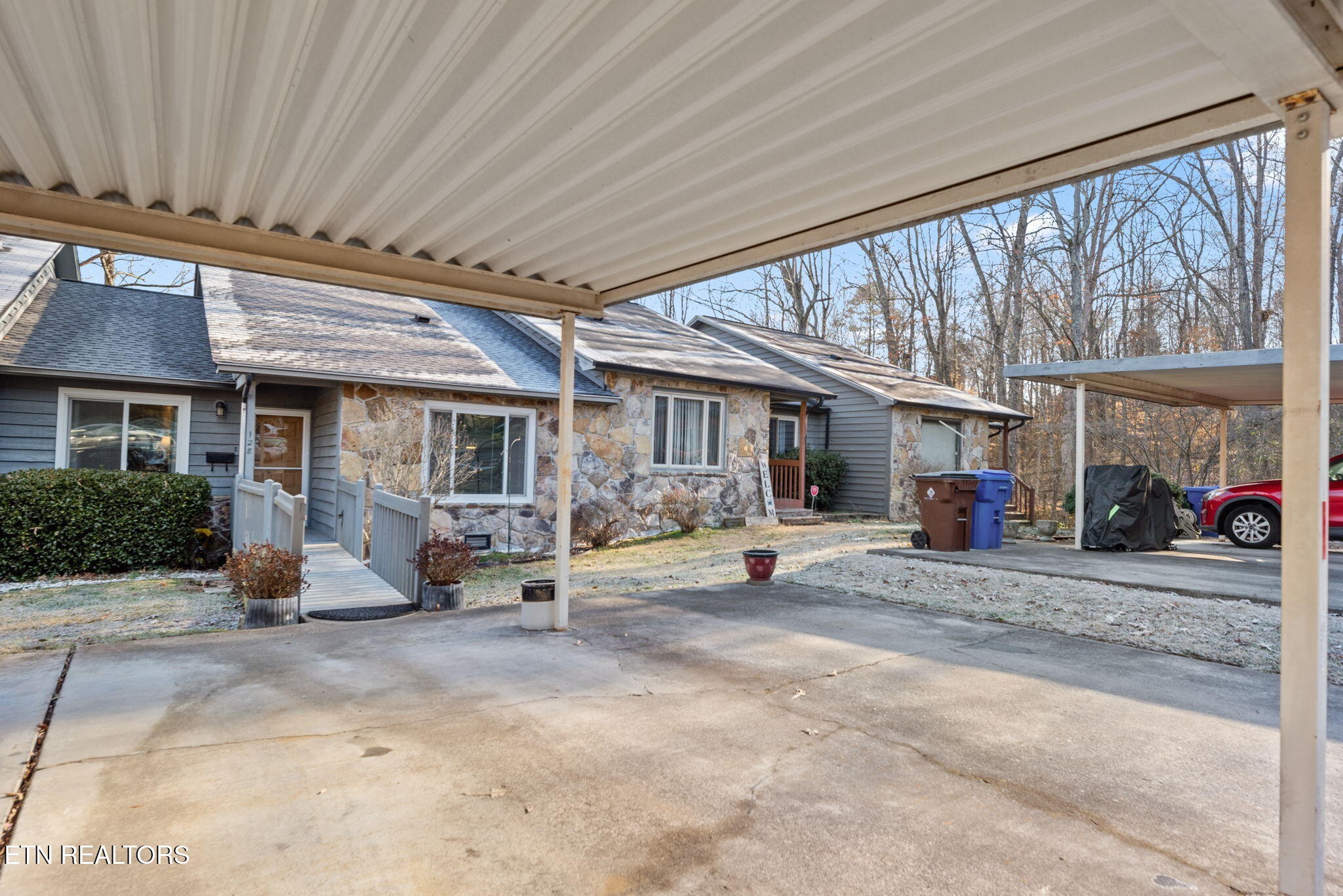 128 Hazleton Lane Oak Ridge, TN 37830 - Photo 3 of 28 a view of a house with sitting area and porch
