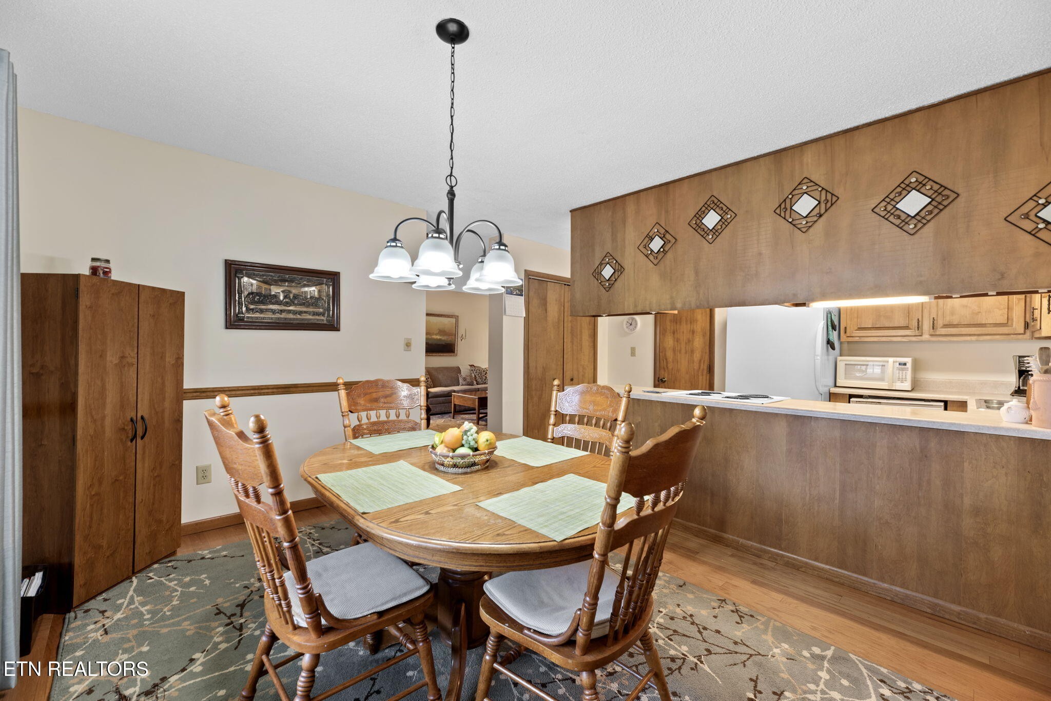 128 Hazleton Lane Oak Ridge, TN 37830 - Photo 8 of 28 a view of a dining room with furniture window and wooden floor