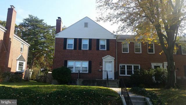 1832 Edgewood Road Baltimore, MD 21286 - Photo 1 of 13 a front view of a house with garden