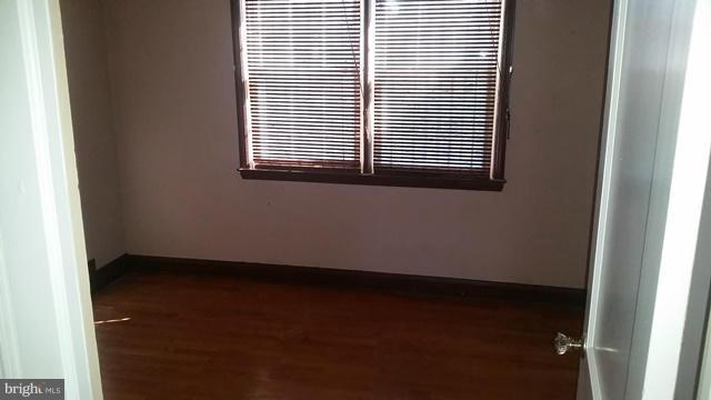 1832 Edgewood Road Baltimore, MD 21286 - Photo 9 of 13 a view of a room that has a window in it