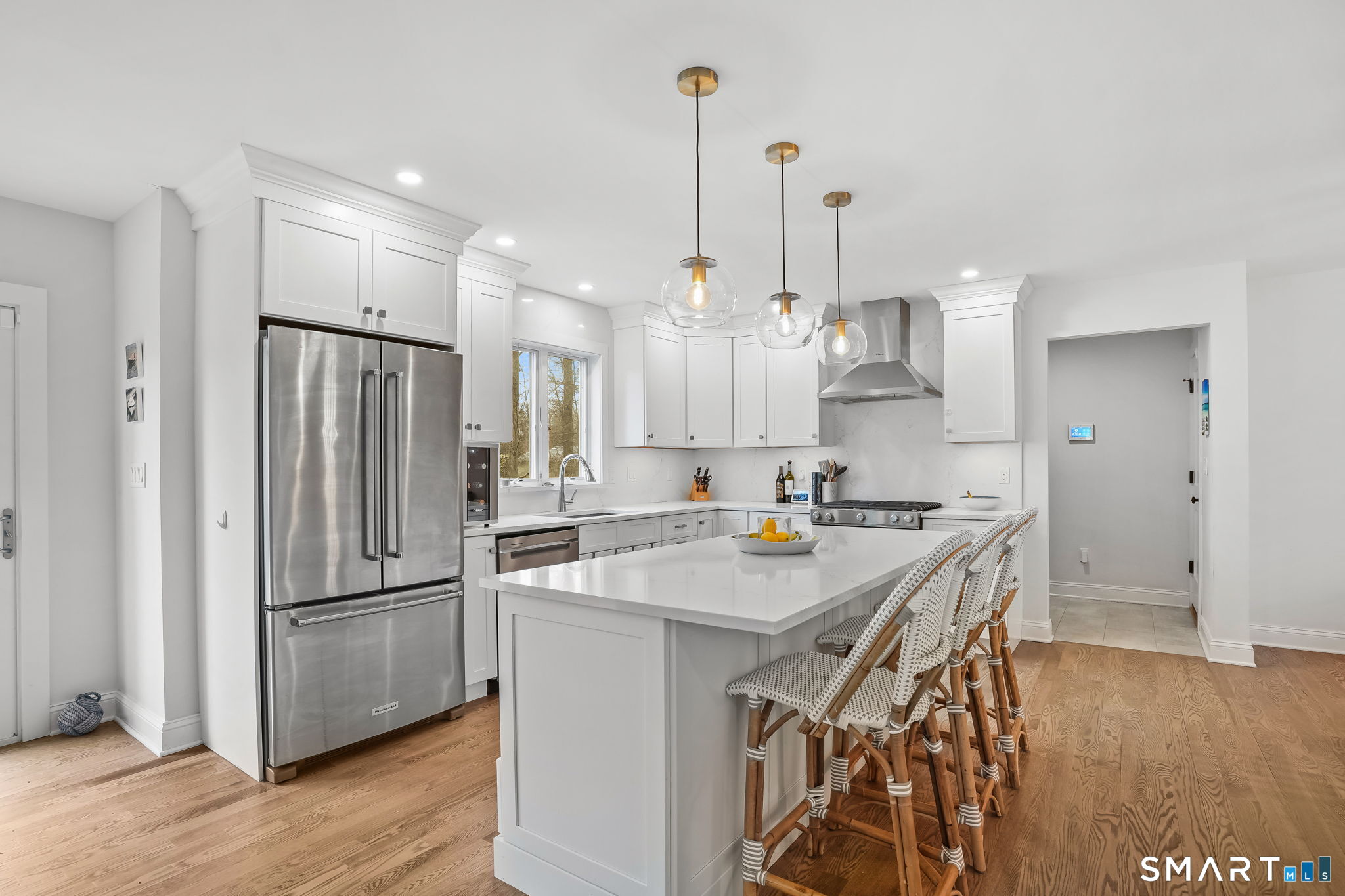 153 North Street Trumbull, CT 06611 - Photo 8 of 27 Convenient mudroom, pantry, and garage access just off the kitchen