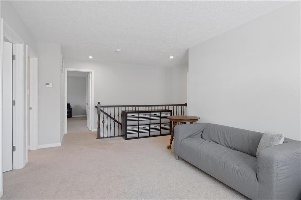 233 Wyncrest Drive Butler, PA 16001 - Photo 11 of 25 a living room with furniture and white walls