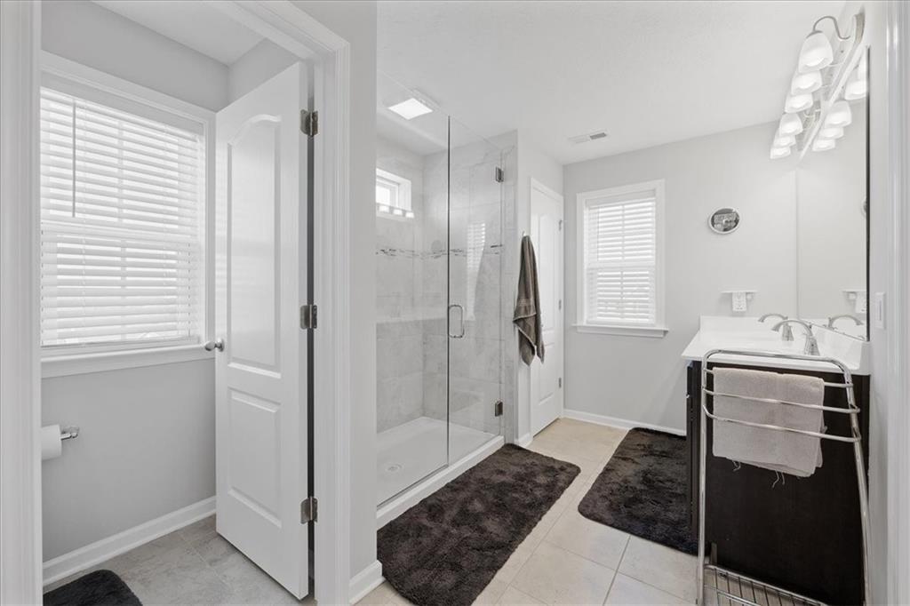 233 Wyncrest Drive Butler, PA 16001 - Photo 19 of 25 a bathroom with a shower and a sink