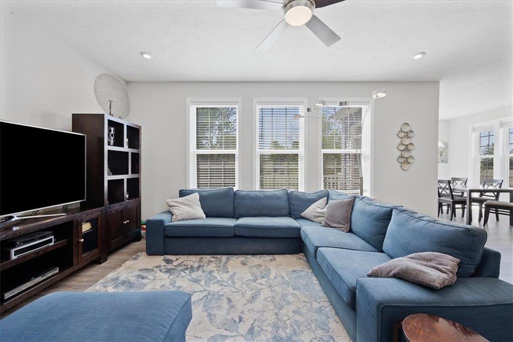 233 Wyncrest Drive Butler, PA 16001 - Photo 10 of 25 a living room with furniture and a flat screen tv