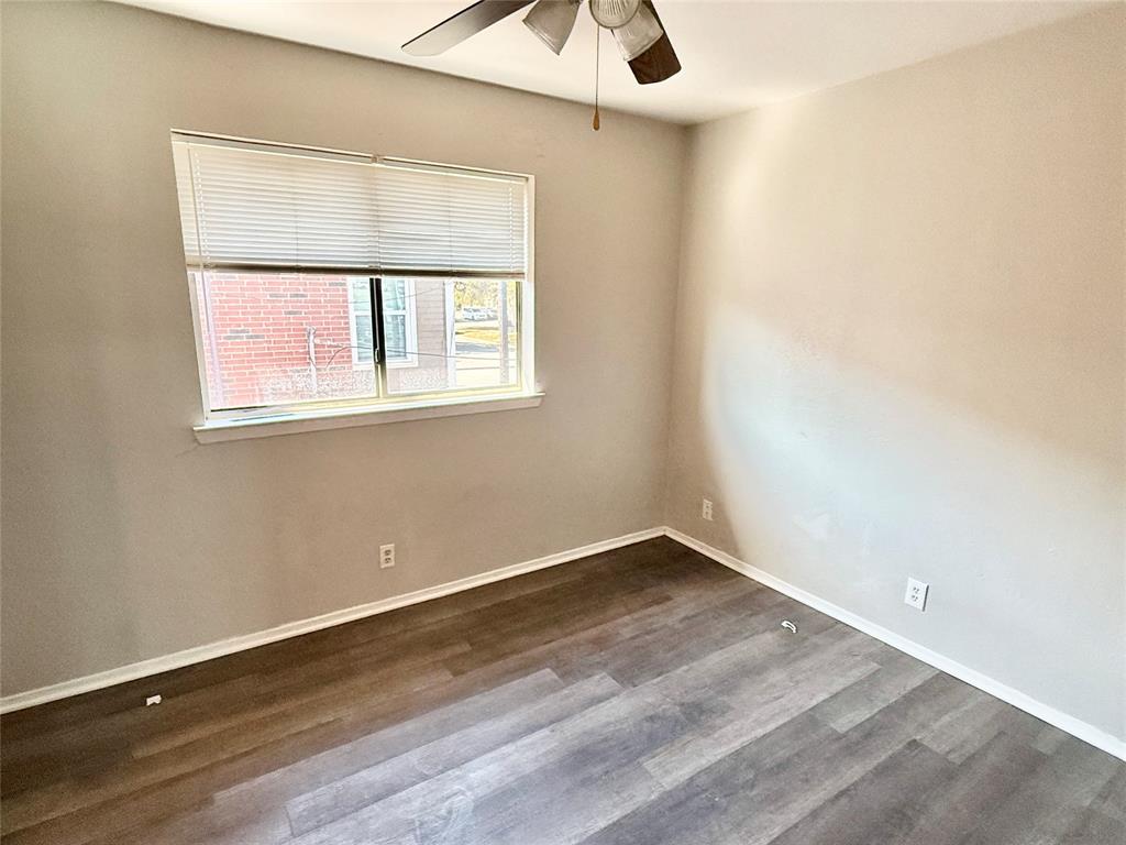 2221 Stella Street, Unit 4 Denton, TX 76201 - Photo 11 of 11 an empty room with a window