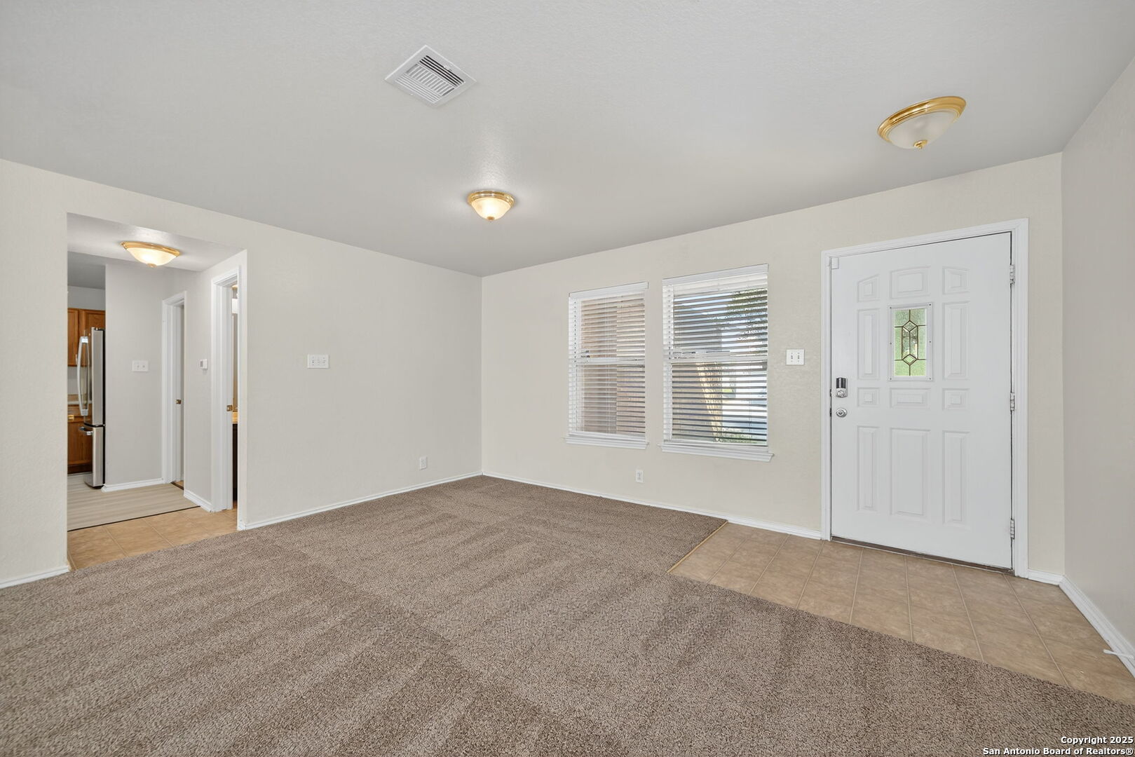 7719 Mesquite Farm San Antonio, TX 78239 - Photo 16 of 27 a view of an empty room with a window