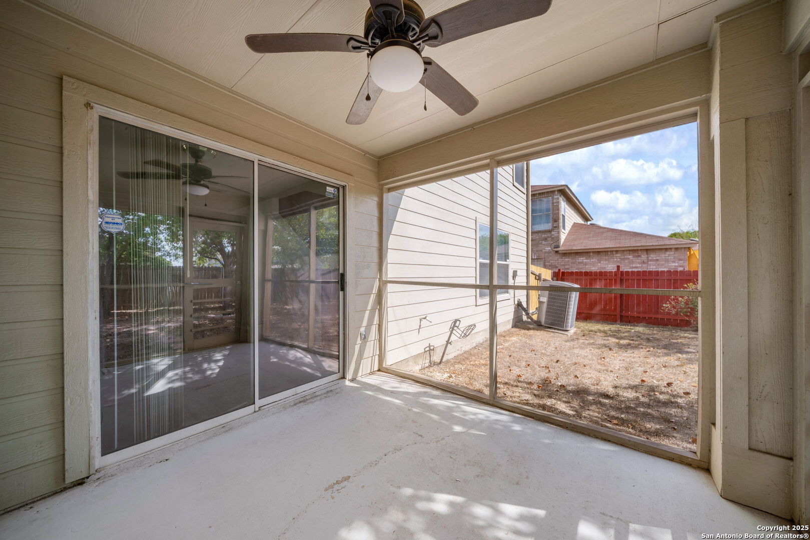 7719 Mesquite Farm San Antonio, TX 78239 - Photo 24 of 27 a view of a room with wooden floor and windows