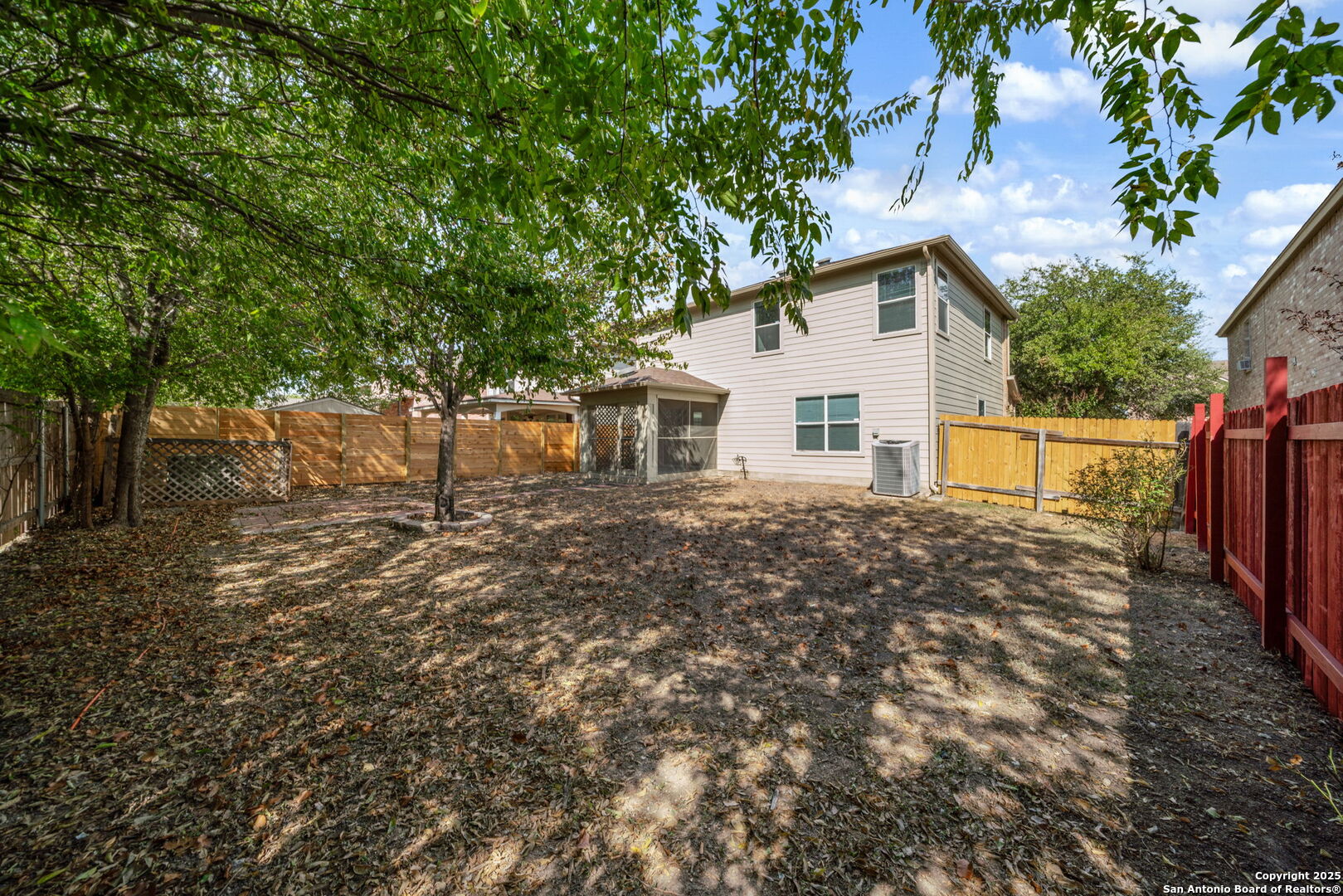 7719 Mesquite Farm San Antonio, TX 78239 - Photo 27 of 27 a view of a house with a backyard