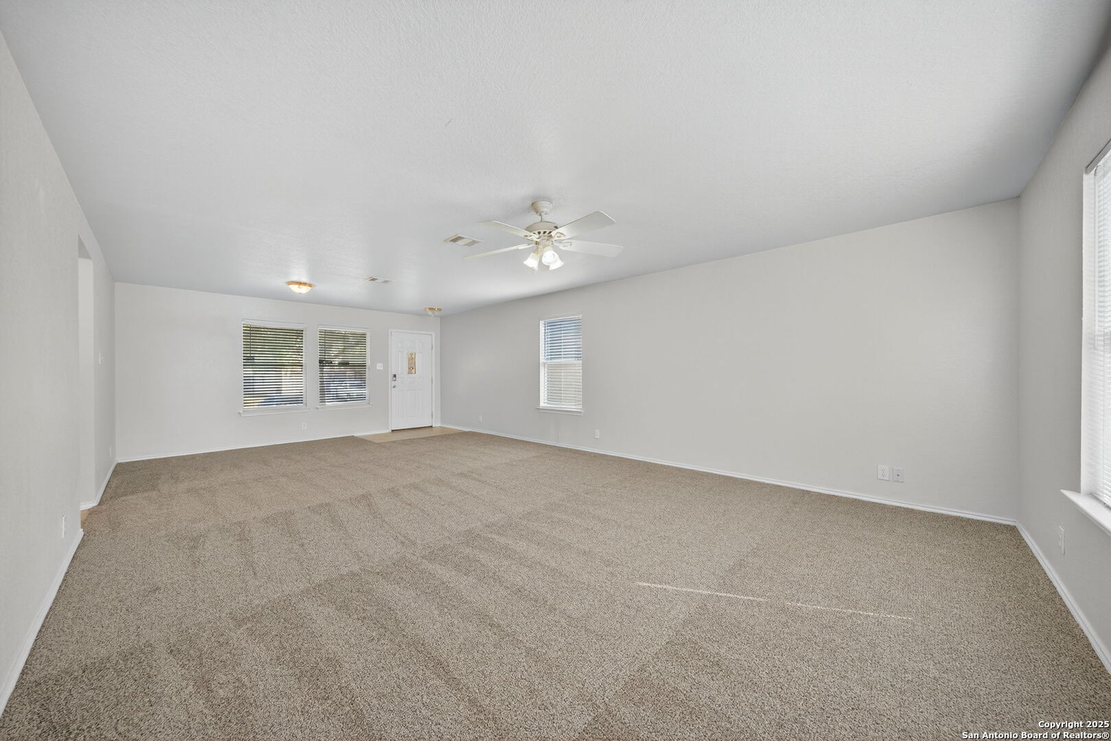 7719 Mesquite Farm San Antonio, TX 78239 - Photo 8 of 27 a view of an empty room