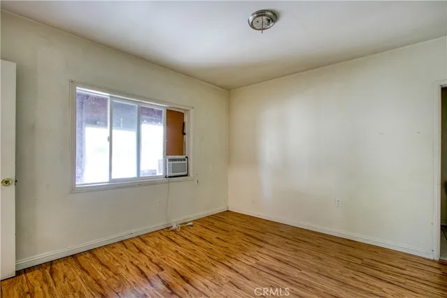 a view of an empty room and window