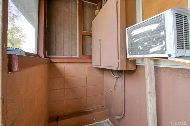 a view of a door and a window