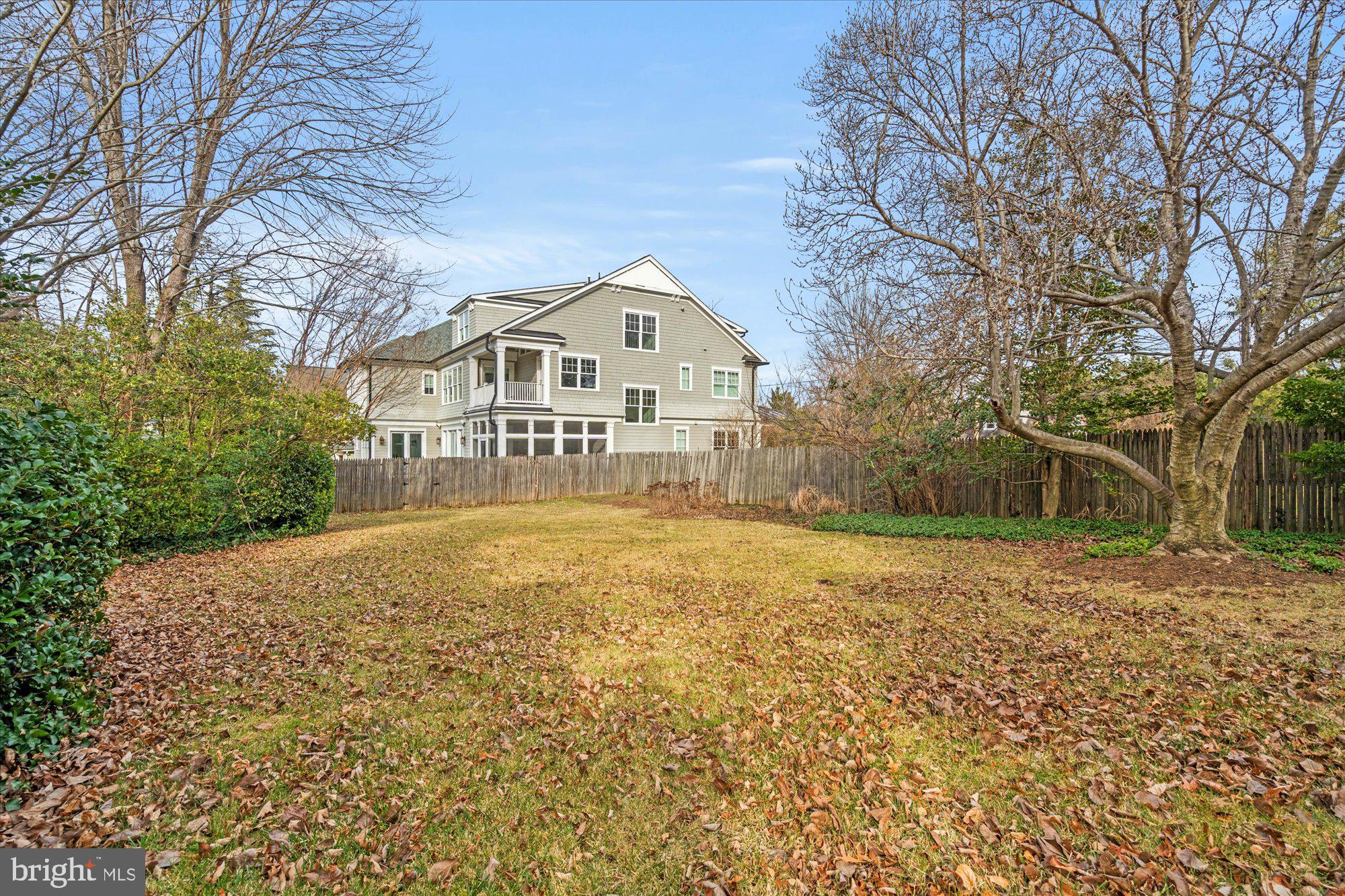 3803 Taylor Street Chevy Chase, MD 20815 - Photo 33 of 35 a front view of a house with a yard