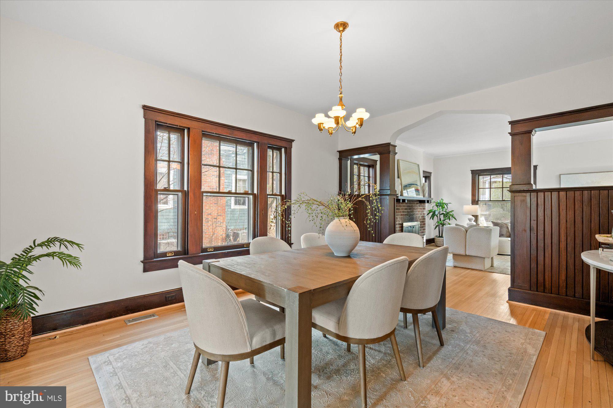 3803 Taylor Street Chevy Chase, MD 20815 - Photo 6 of 35 a view of a dining room with furniture window and wooden floor