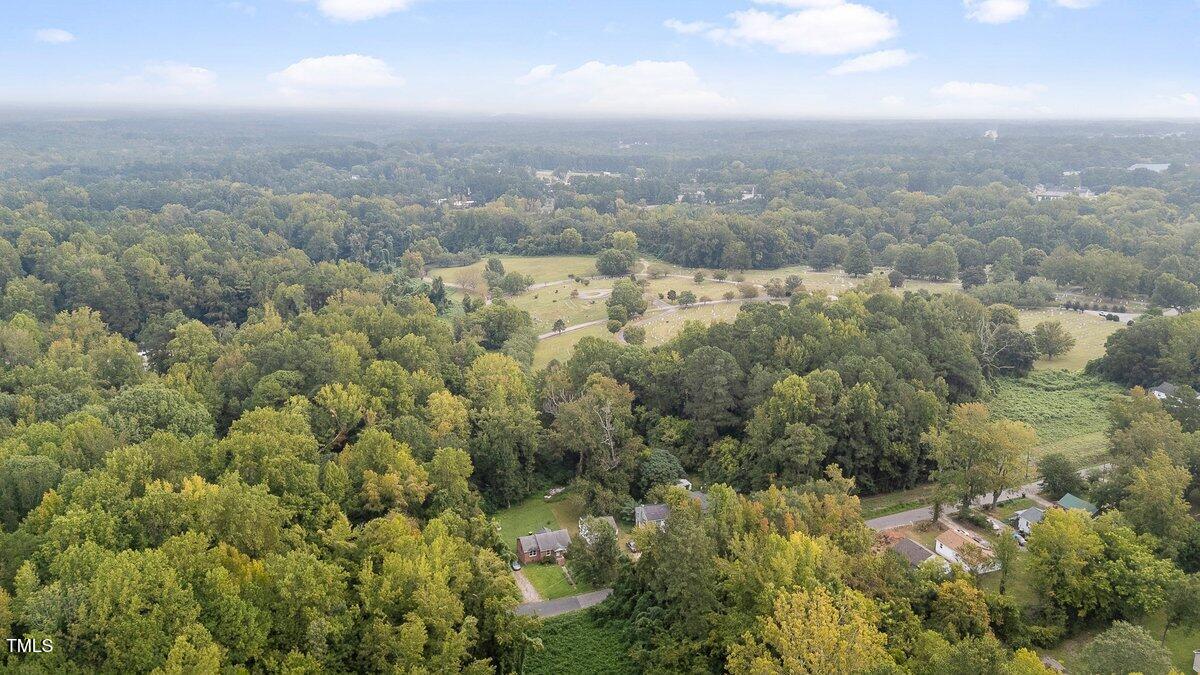 0 Merriman Street Henderson, NC 27536 - Photo 2 of 5 an aerial view of houses covered in trees