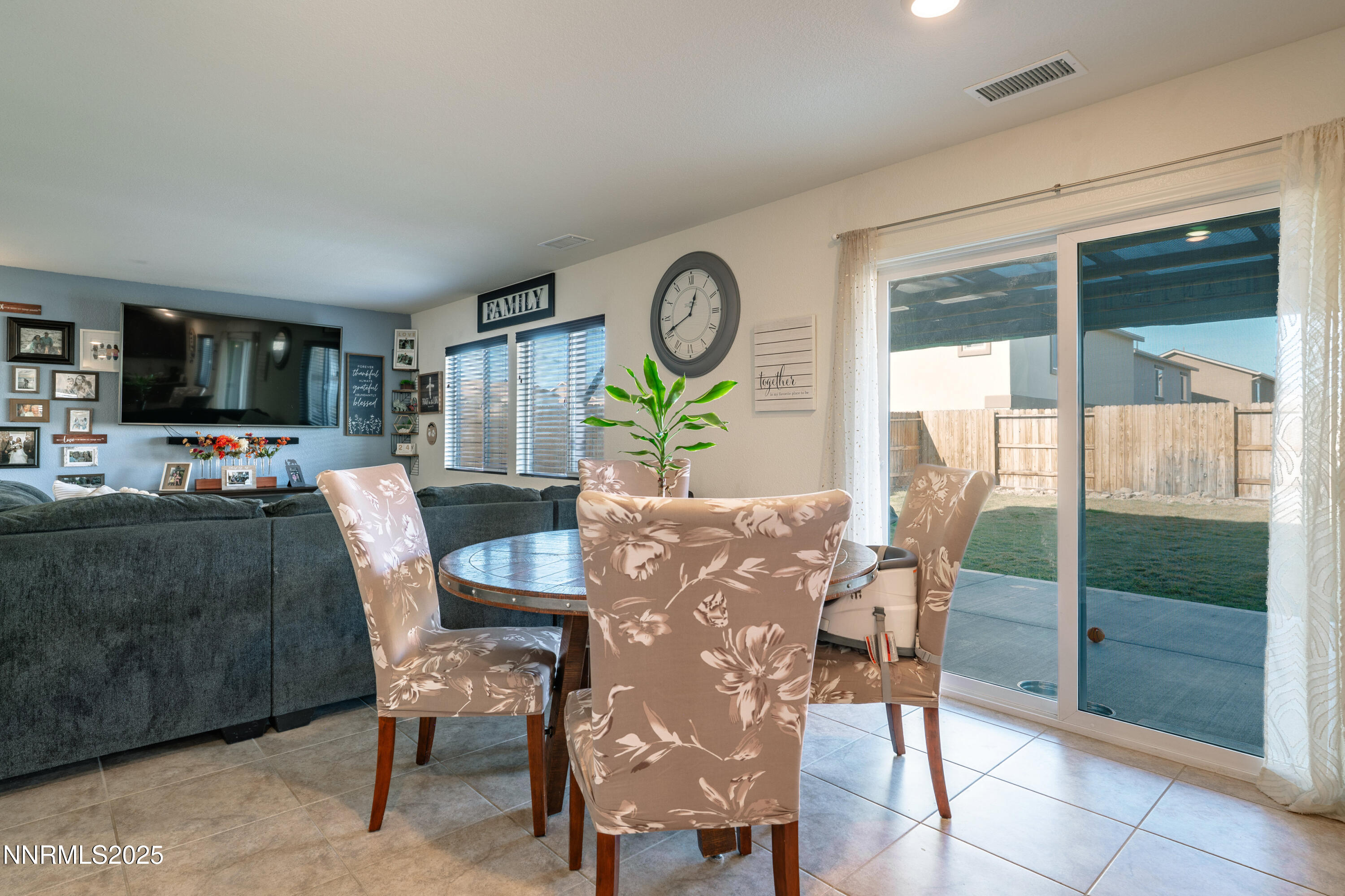 909 Convair Way Reno, NV 89506 - Photo 15 of 42 a view of a dining room with furniture window and outside view