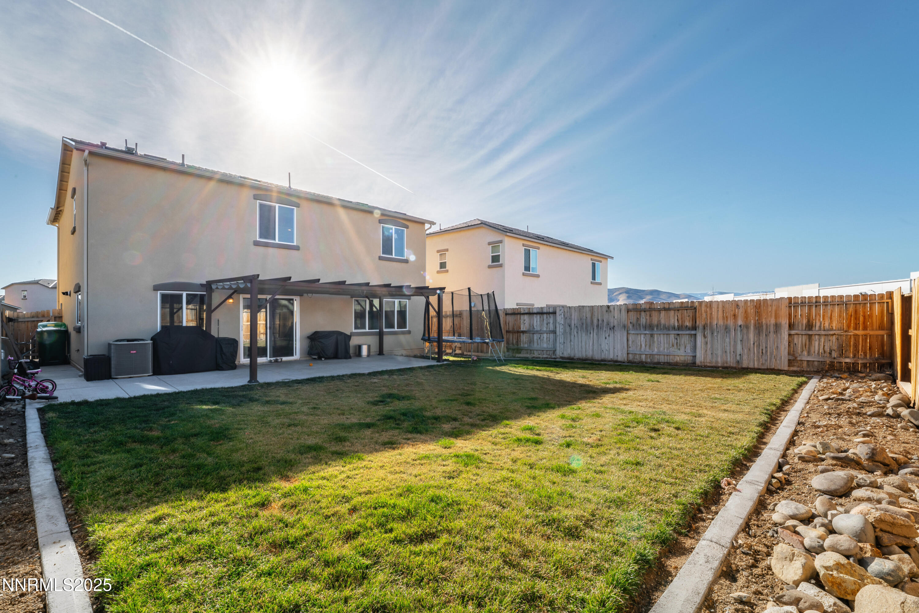 909 Convair Way Reno, NV 89506 - Photo 34 of 42 a view of a house with backyard and sitting area