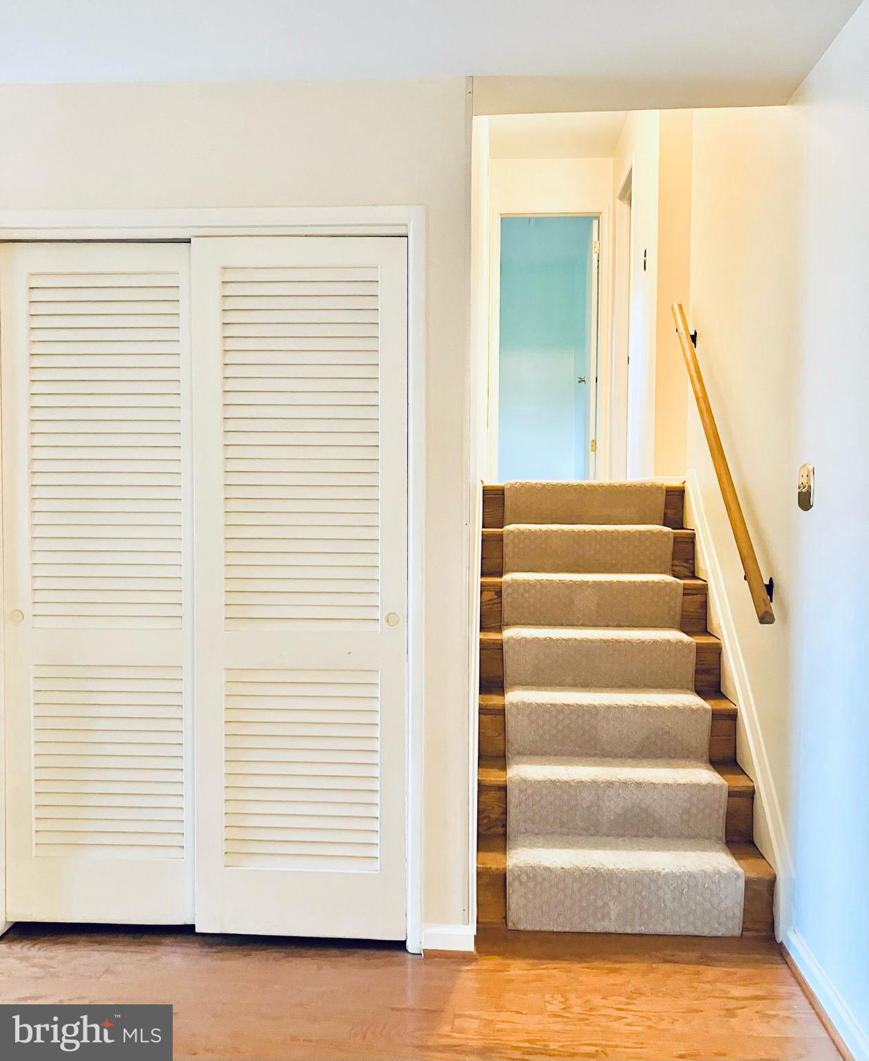 5205 Ravensworth Road Springfield, VA 22151 - Photo 10 of 22 Coat Closet and Stairs