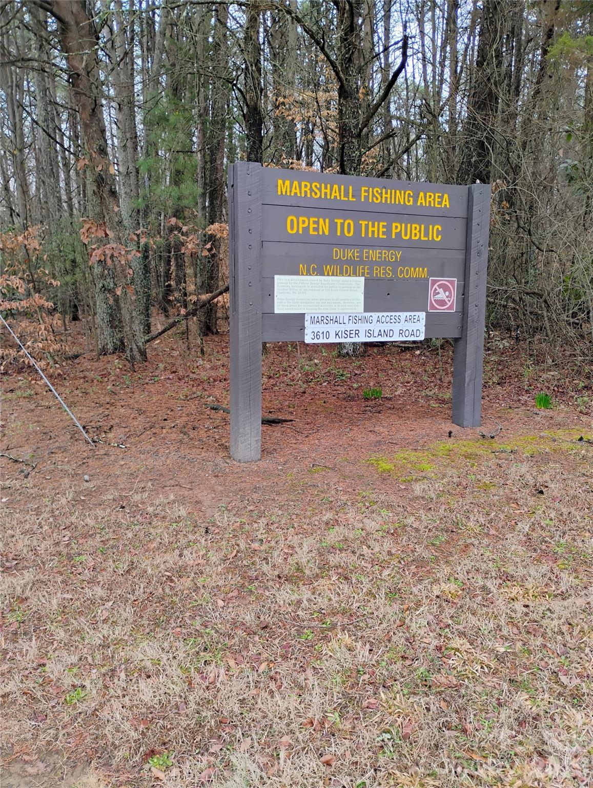 3968 Kiser Island Road Terrell, NC 28682 - Photo 25 of 25 a sign that is sitting in the middle of a forest