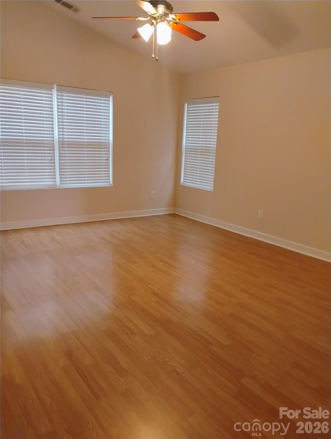 3968 Kiser Island Road Terrell, NC 28682 - Photo 3 of 25 an empty room with windows and fan