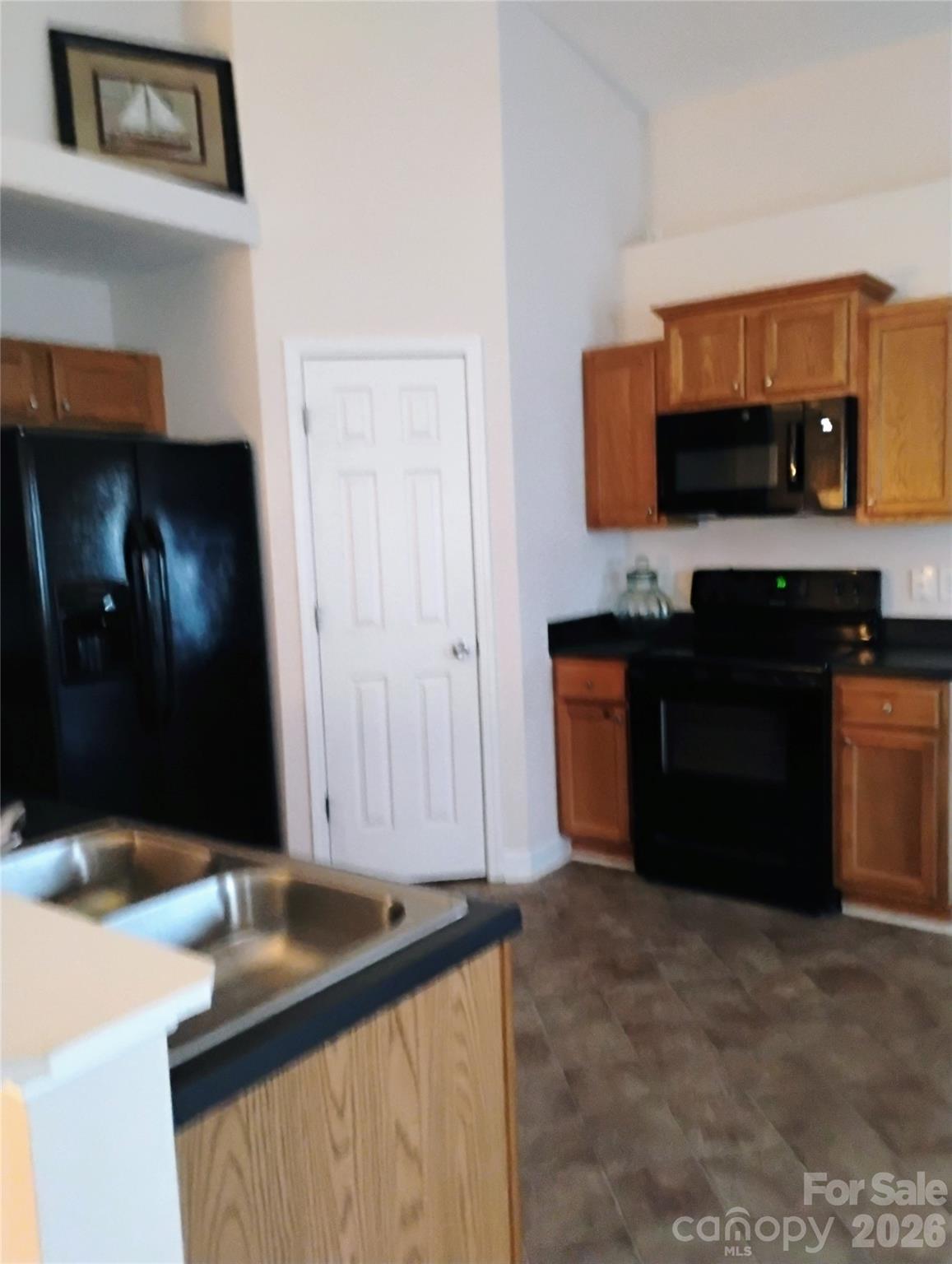 3968 Kiser Island Road Terrell, NC 28682 - Photo 6 of 25 a kitchen with a sink and a refrigerator