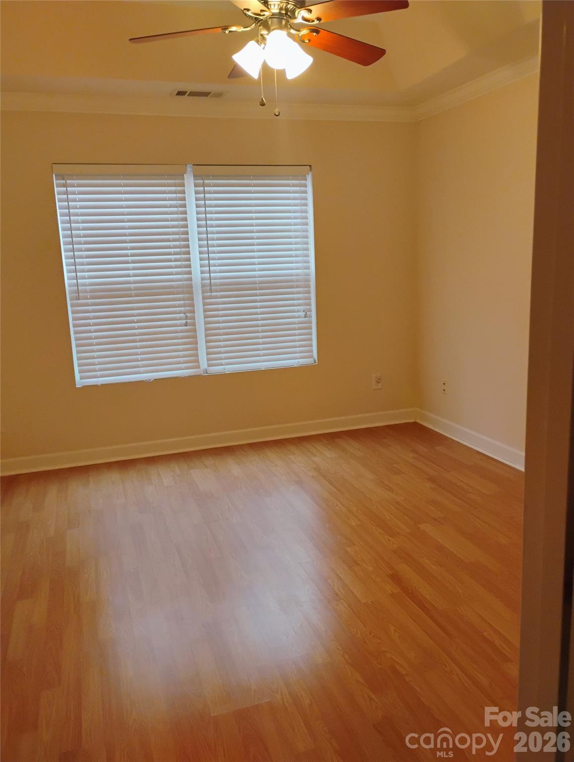 3968 Kiser Island Road Terrell, NC 28682 - Photo 10 of 25 a view of an empty room with wooden floor and a window